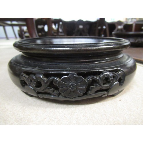 249 - Quantity of various Chinese hardwood carved and pierced circular vase stands