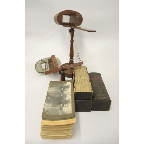 120 - Two handheld stereo viewers, together with a quantity of stereo cards including South African war