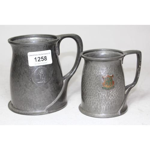 Two Archibald Knox for Liberty Tudric pewter tankards (for golfing trophies)