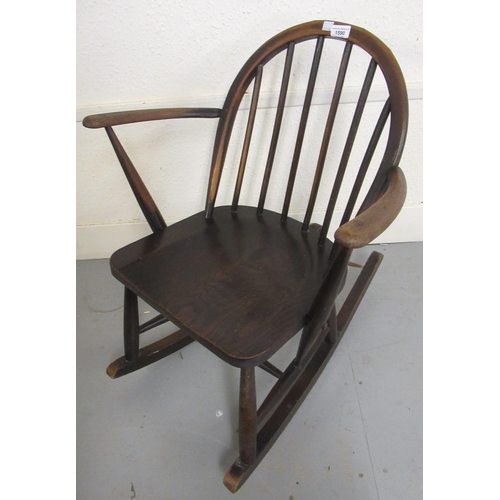 1590 - Mid 20th Century Ercol dark stained rocking chair with stick back