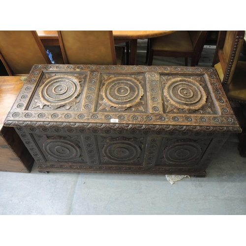 1596 - Late 19th Century oak coffer having three panels with carved roundel decoration (possibly Brittany),... 