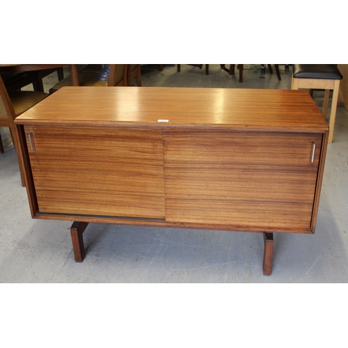 1613 - 20th Century teak low sideboard by Lucas, with sliding doors and polished metal handles, 66cm high x... 