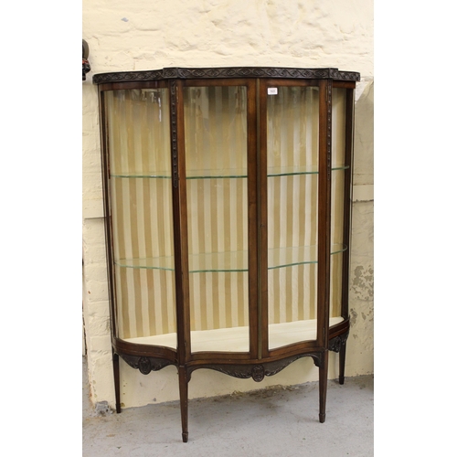 1625 - Early 20th Century mahogany serpentine shaped two door display cabinet with blind fretwork decoratio... 