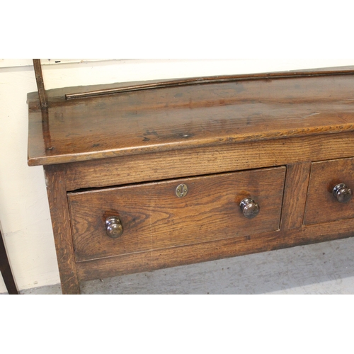 1644 - George III oak dresser, the open shelf back above an arrangement of drawers, 197cm high x 181cm wide... 