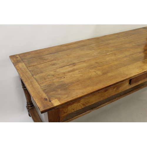 1649 - 19th Century French fruitwood farmhouse table, the plank top above a plain frieze with single drawer... 