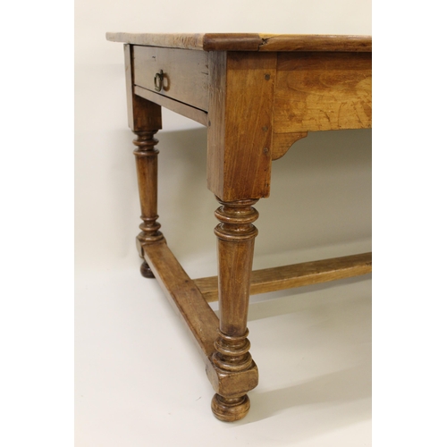 1649 - 19th Century French fruitwood farmhouse table, the plank top above a plain frieze with single drawer... 