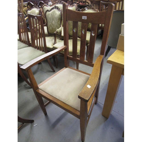 1660 - Arts and Crafts oak elbow chair with drop-in seat, modern rattan and iron garden chair and a camel s... 