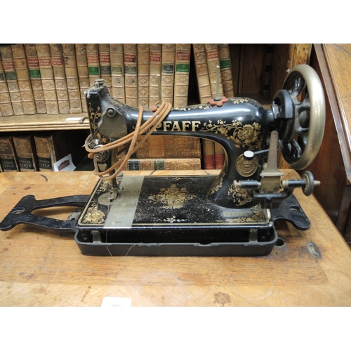 305 - Treadle sewing machine by Pfaf