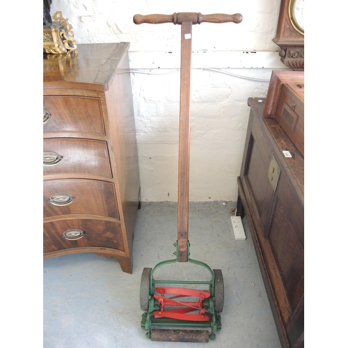 316 - Early Ransomes hand operated lawnmower, together with another by T. Green & Son, Leeds and London