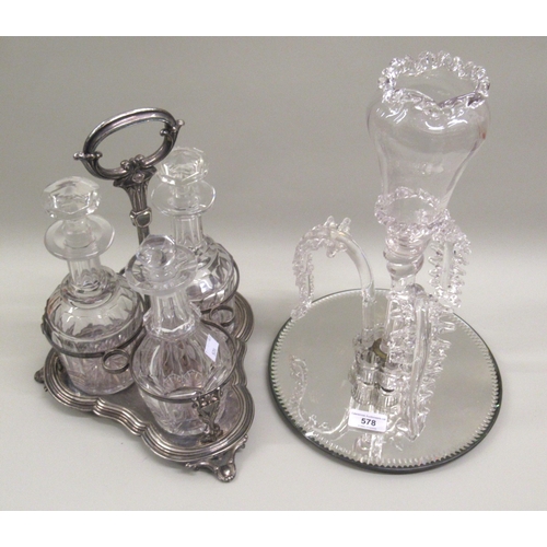 19th Century glass epergne, together with a set of three glass decanters on a plated stand
