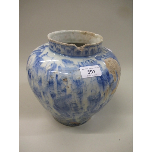 Continental tin glazed pottery baluster form vase with blue and white floral decoration (at fault)