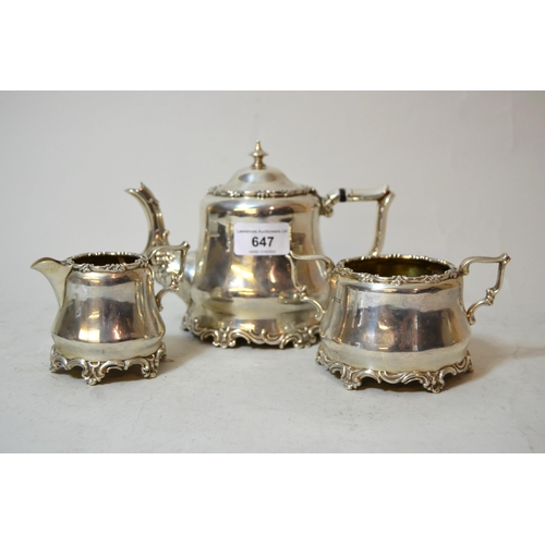 Early 20th Century Sheffield silver three piece bachelor's tea service with embossed floral decoration, 23oz t
