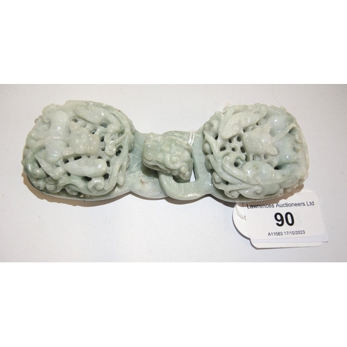 90 - 20th Century carved mottled pale green jade belt buckle in two parts, decorated in deep relief, 12.5... 