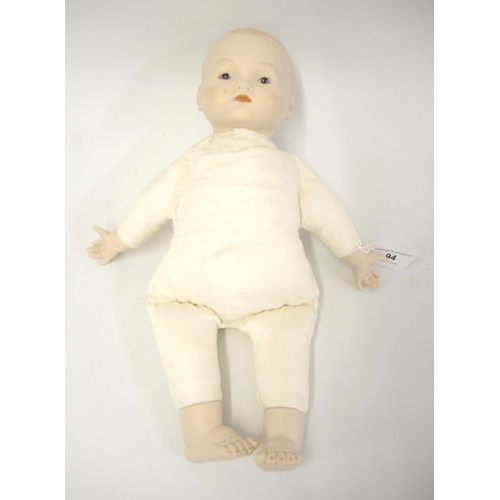 94 - Armand Marseille bisque headed baby doll with soft body and porcelain hands and feet marked AM