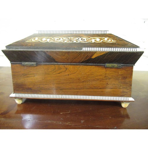 1627 - Regency rosewood ivory mounted and inlaid sewing box, the hinged lid enclosing a fitted interior wit... 