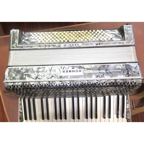 104 - Hohner piano accordion in fitted case