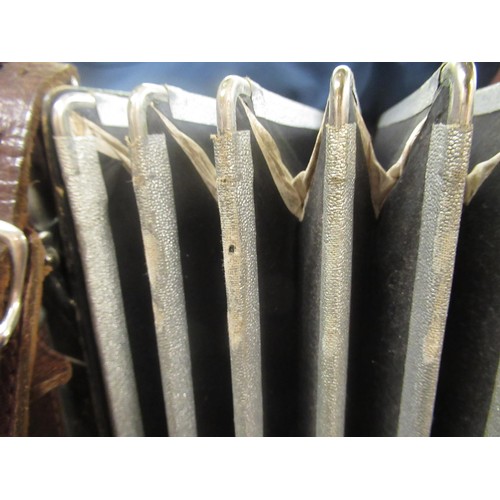 104 - Hohner piano accordion in fitted case