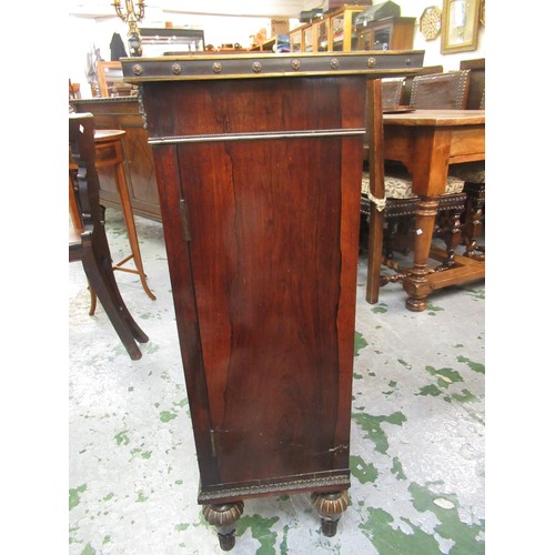 1624 - Pair of Regency rosewood and cut brass inlaid two door side cabinets, each with a brassbound and cro... 