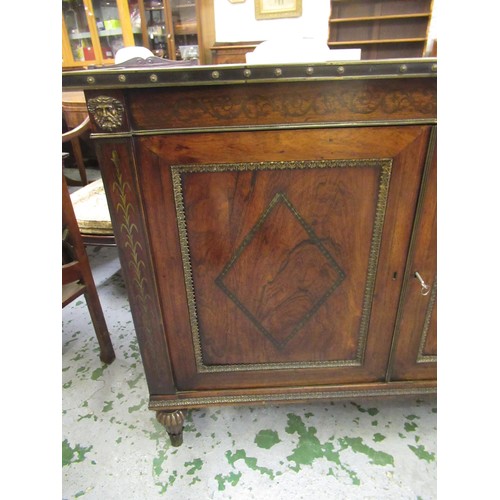 1624 - Pair of Regency rosewood and cut brass inlaid two door side cabinets, each with a brassbound and cro... 