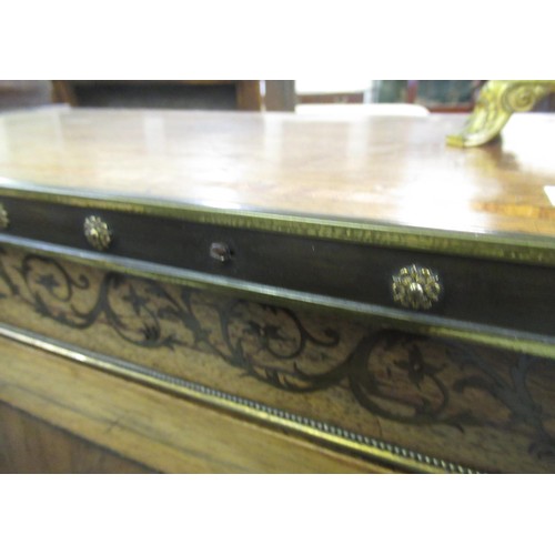 1624 - Pair of Regency rosewood and cut brass inlaid two door side cabinets, each with a brassbound and cro... 