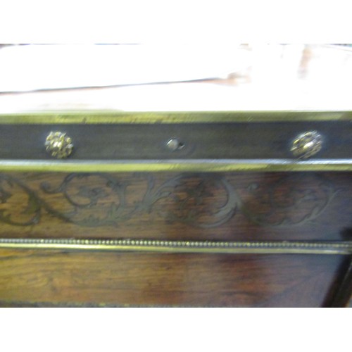 1624 - Pair of Regency rosewood and cut brass inlaid two door side cabinets, each with a brassbound and cro... 