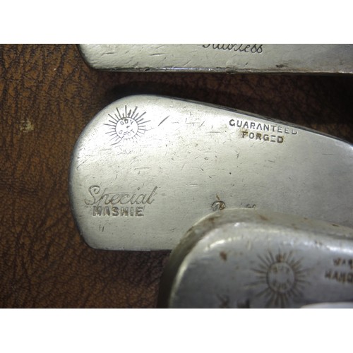 323 - Seven various hickory shafted golf clubs