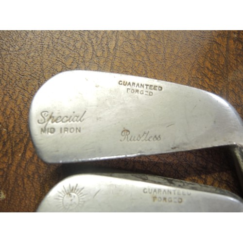 323 - Seven various hickory shafted golf clubs