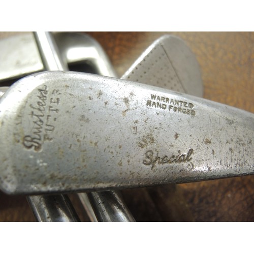 323 - Seven various hickory shafted golf clubs