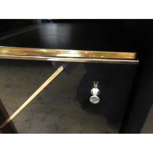 1970's Italian black lacquer and brass sideboard with foldout table top ...