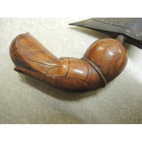 211 - Indonesian hardwood handled kris with wooden sheath, together with another bone handled and brass mo... 