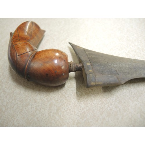 211 - Indonesian hardwood handled kris with wooden sheath, together with another bone handled and brass mo... 