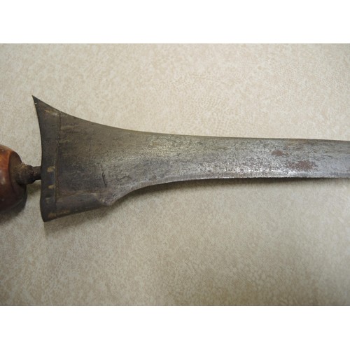 211 - Indonesian hardwood handled kris with wooden sheath, together with another bone handled and brass mo... 