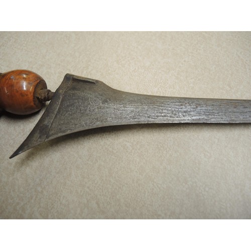 211 - Indonesian hardwood handled kris with wooden sheath, together with another bone handled and brass mo... 