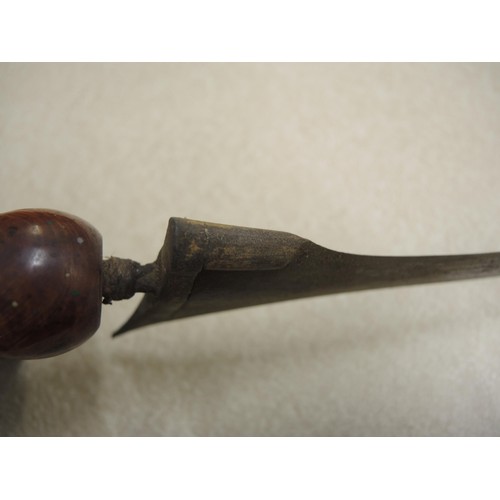 211 - Indonesian hardwood handled kris with wooden sheath, together with another bone handled and brass mo... 