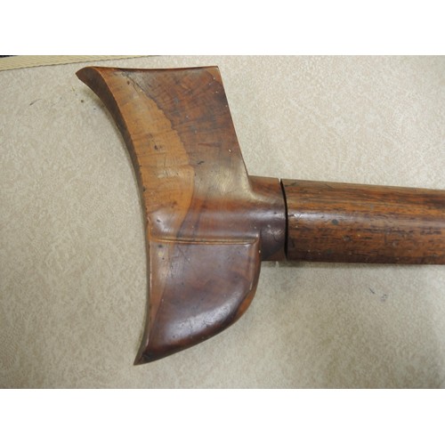 211 - Indonesian hardwood handled kris with wooden sheath, together with another bone handled and brass mo... 