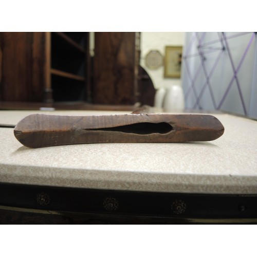 211 - Indonesian hardwood handled kris with wooden sheath, together with another bone handled and brass mo... 