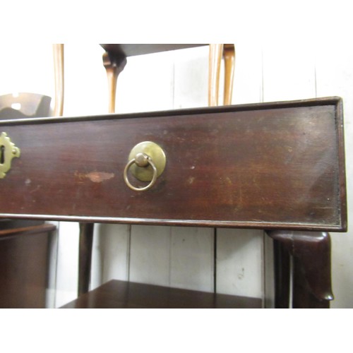 1602 - 19th Century mahogany side table in George II style, with a single frieze drawer raised on turned su... 