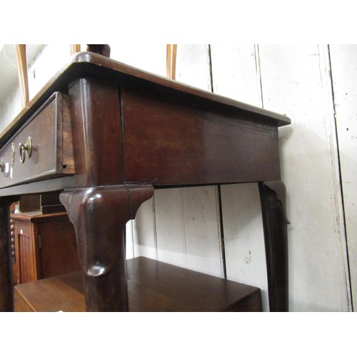 1602 - 19th Century mahogany side table in George II style, with a single frieze drawer raised on turned su... 