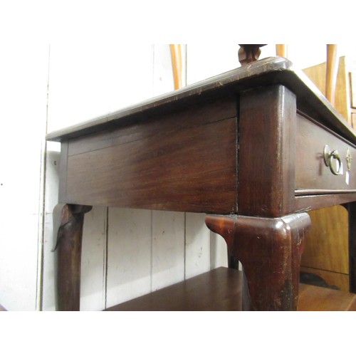 1602 - 19th Century mahogany side table in George II style, with a single frieze drawer raised on turned su... 