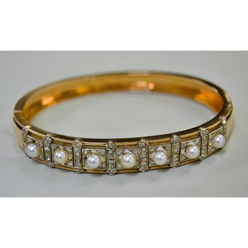 1031 - Late 19th / early 20th Century rose gold cultured pearl and rose cut diamond bangle, in the original... 