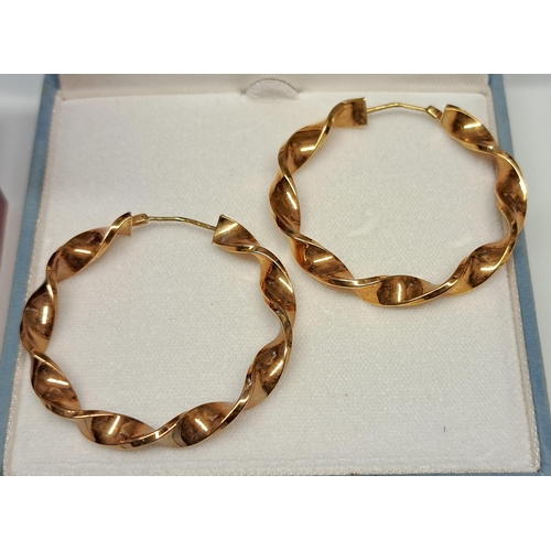 1059 - Pair of large 9ct gold hoop earrings, 5.3g, together with a pair of 9ct gold cultured pearl set earr... 