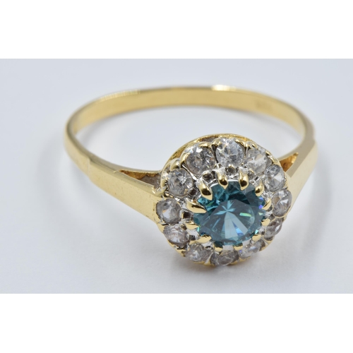 1078 - 18ct Yellow gold blue zircon and diamond cluster ring, size N, 3g