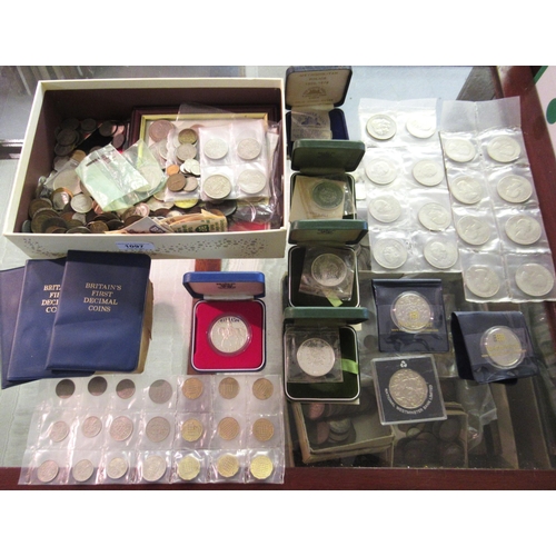 1097 - Box containing a large quantity of various World coinage including some cased silver proof coins, an... 