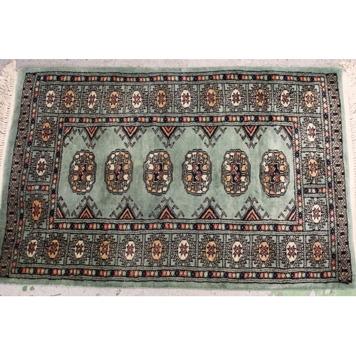 13 - Two Pakistan / Indian Persian design rugs, together with seven similar small mats