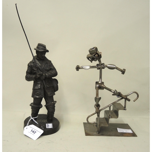 142 - Bronzed resin figure of a fisherman together with a modern nut and bolt sculpture of a roller-skater