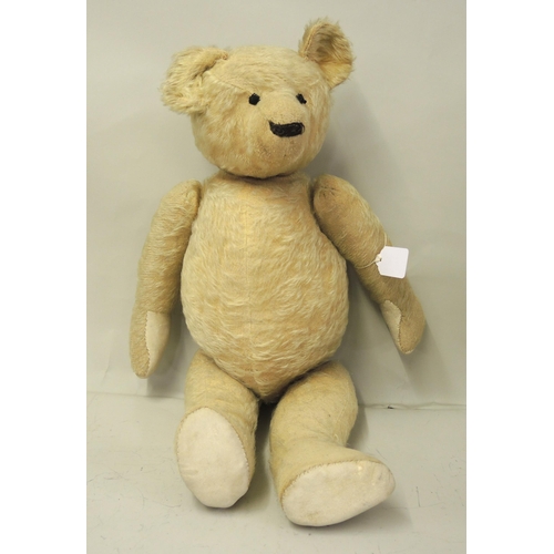 148 - Early to mid 20th Century articulated teady bear, together with a pair of leather cased opera glasse... 