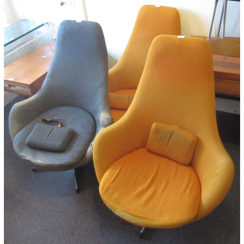 Group of three 1970's swivel armchairs, each with a chrome quadruped base (for restoration)