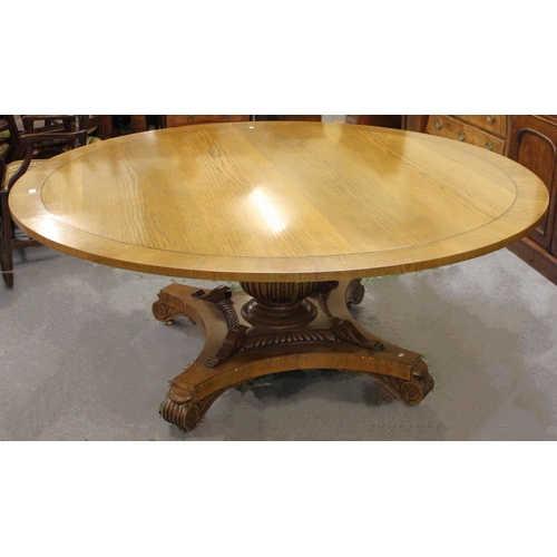 1943 - Large good quality circular oak breakfast table, the crossbanded and line inlaid top above a fluted ... 