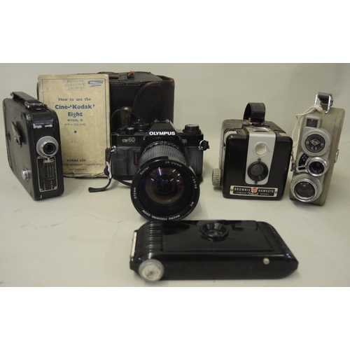 196 - Small quantity of various cameras including a Jiffy Kodak, Olympus OM40 with lens