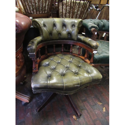 2031 - Reproduction mahogany and green button leather upholstered swivel office chair (upholstery at fault)